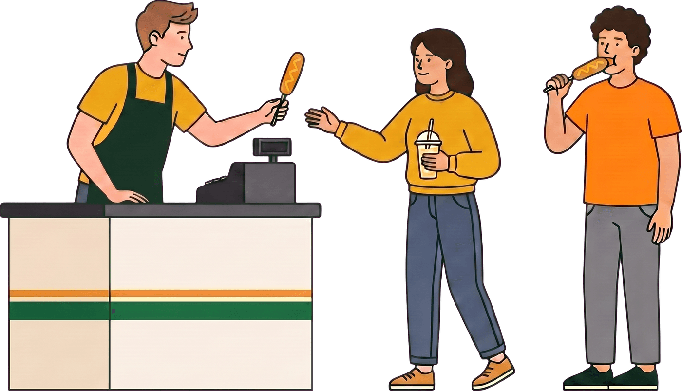 A worker handing a corn dog and a lemonade across the counter